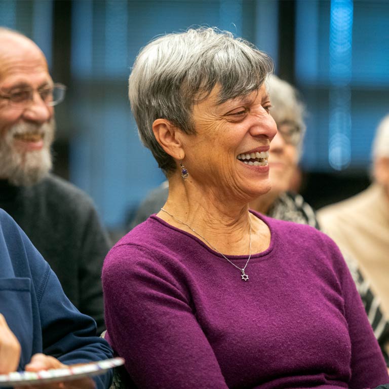 Woman in an audience at an event